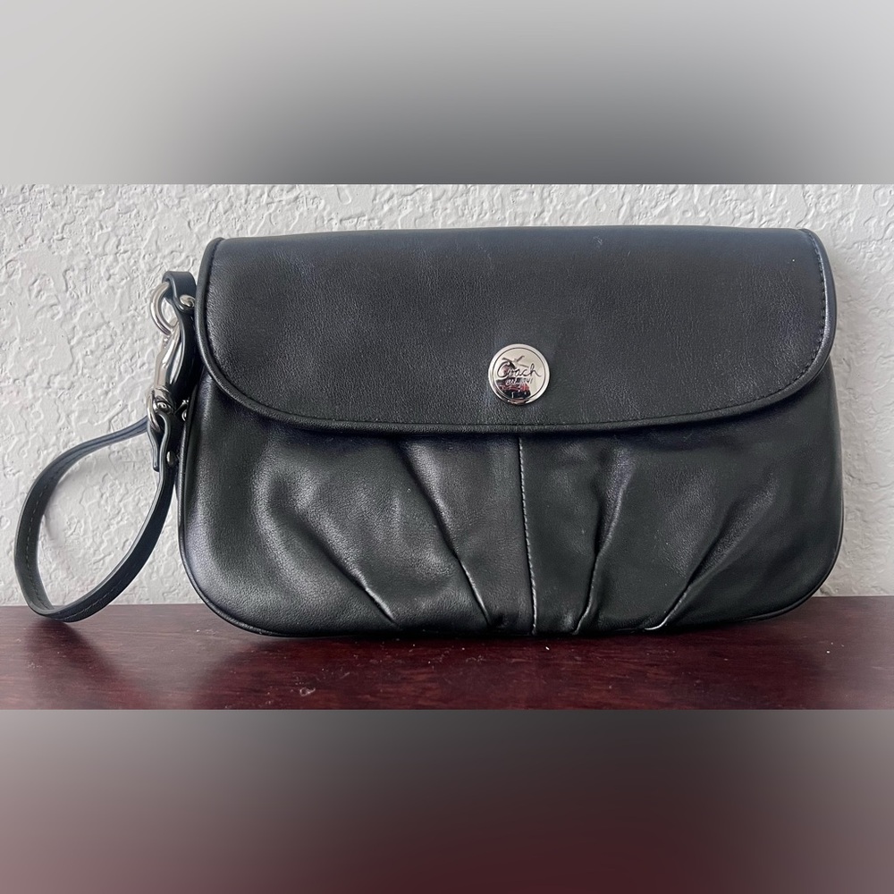 Black pleated Coach clutch